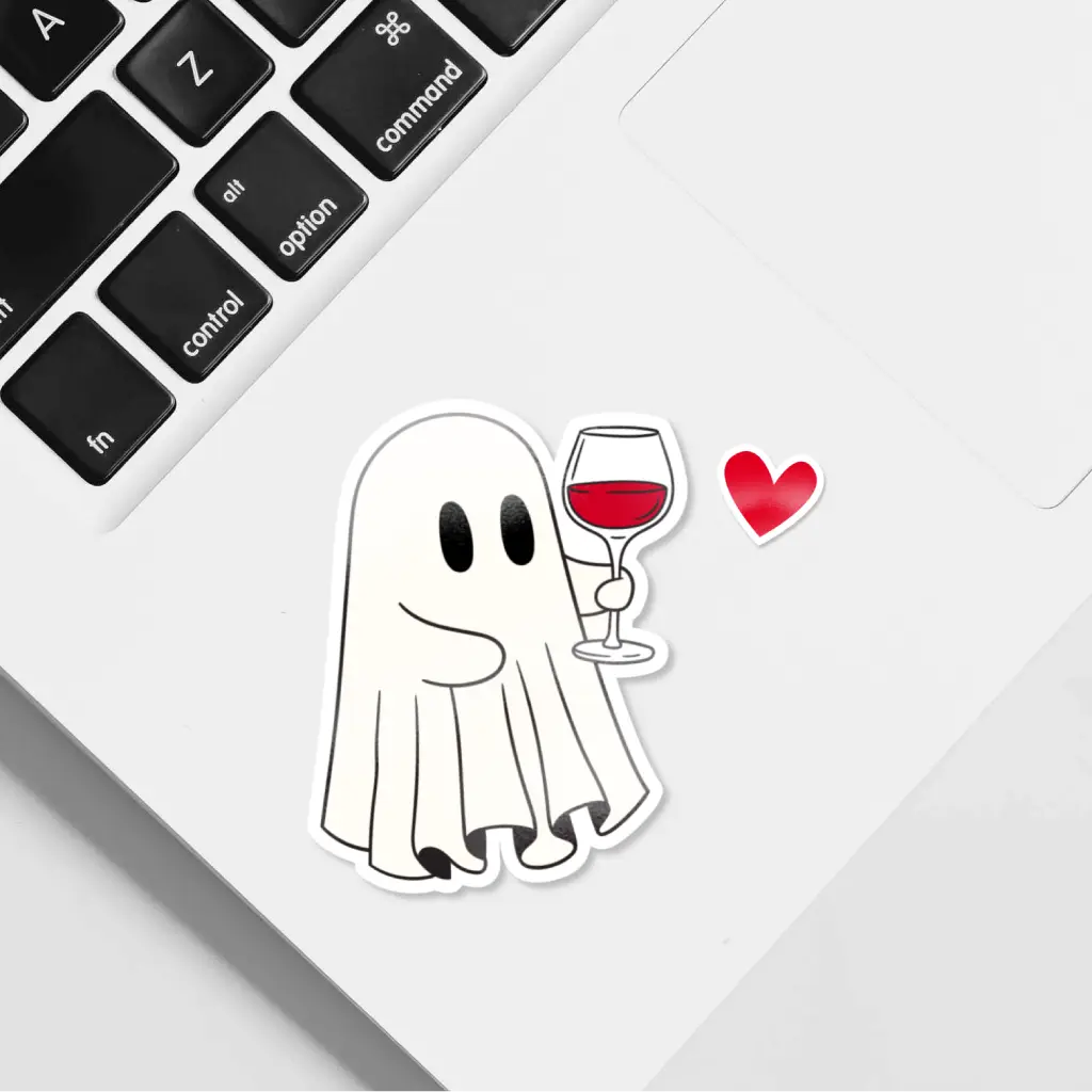 Divertida pegatina de un fantasma bebiendo una copa de vino tinto. Perfecta para regalar. Ideal para decorar el móvil. Regalo para amantes del vino