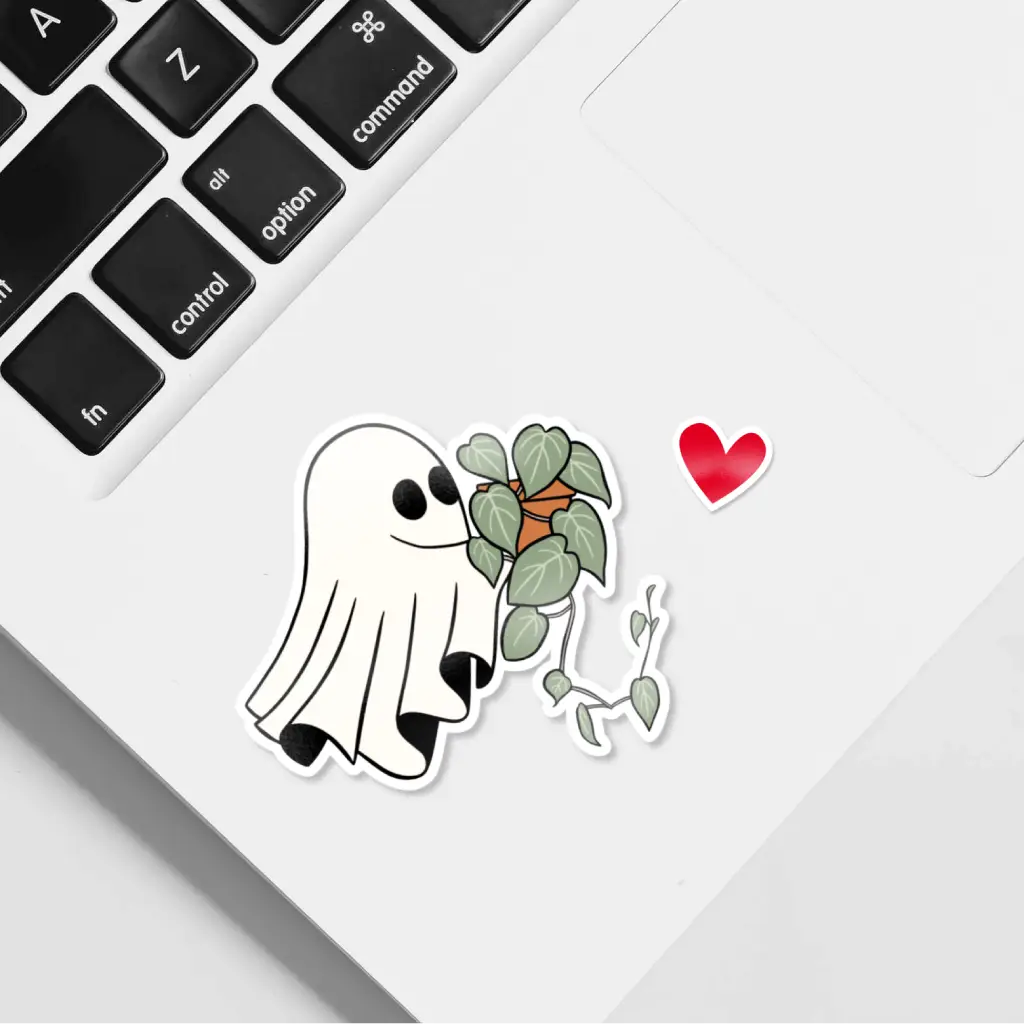 Sticker de un tierno fantasma con un Potos colgante. Perfecto para decoraciones botánicas con un toque spooky cute.